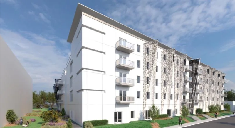 Façade blanche avec balcons, vue en angle