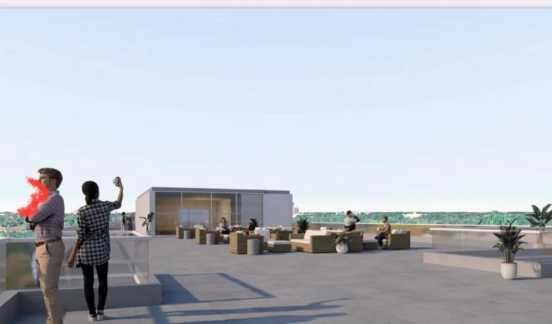 Terrasse sur le toit avec mobilier et résidents